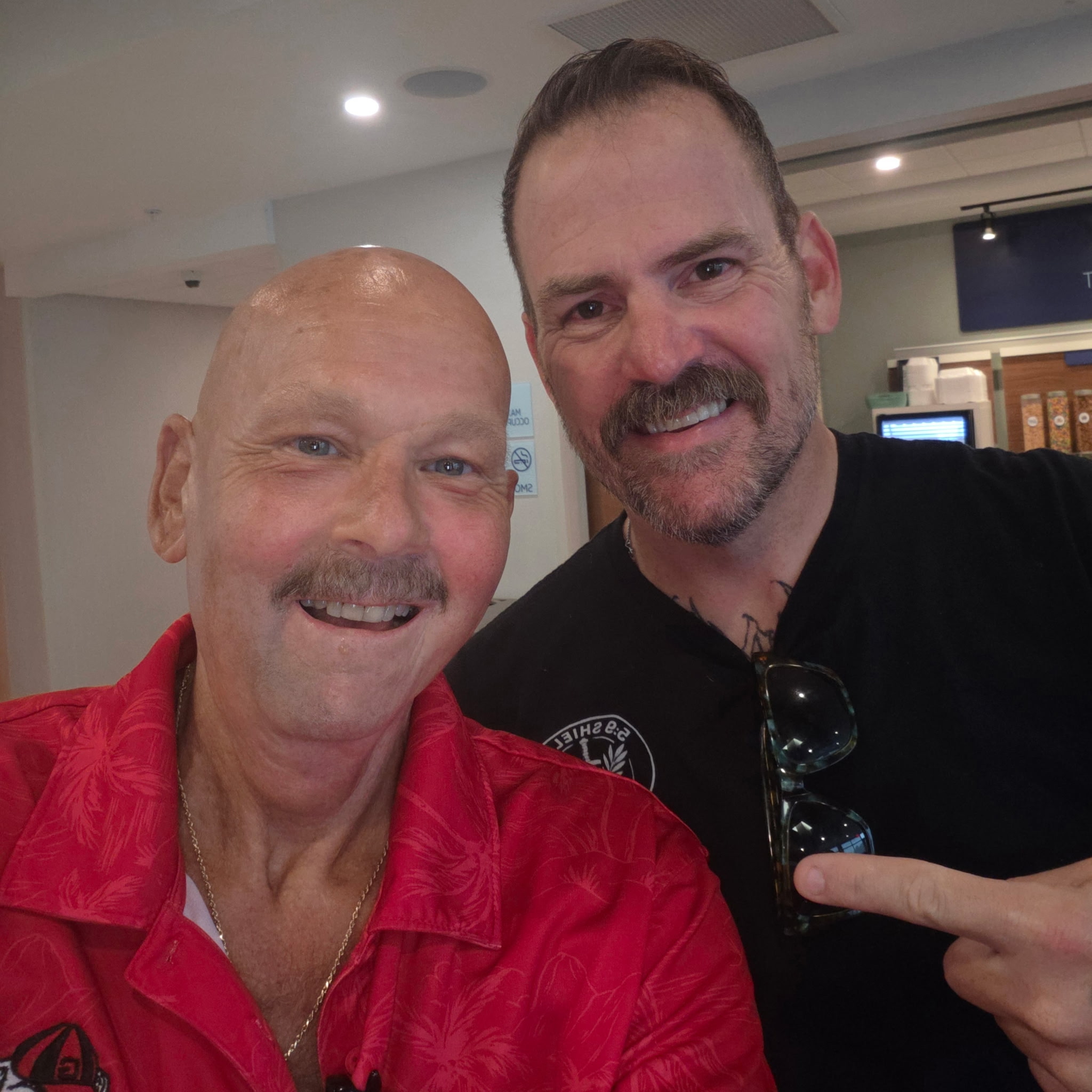 David smiling with a friend